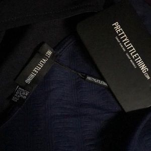 Navy asymmetric neck pleated wrap midi dress